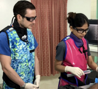 Two radiologists in fluoroscopy room